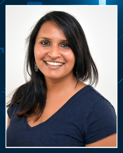 Ankita Jhaveri headshot: woman with dark brown hair and blue t-shirt 