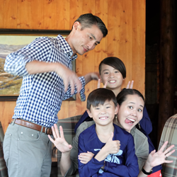 Tania Ziegler, Kenneth Ho, and their children.