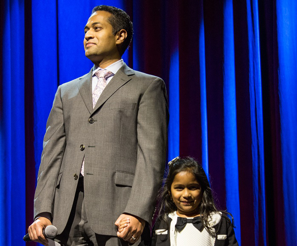 Dads for Daughter's member, Vijay Kotte, on stage with his daughter