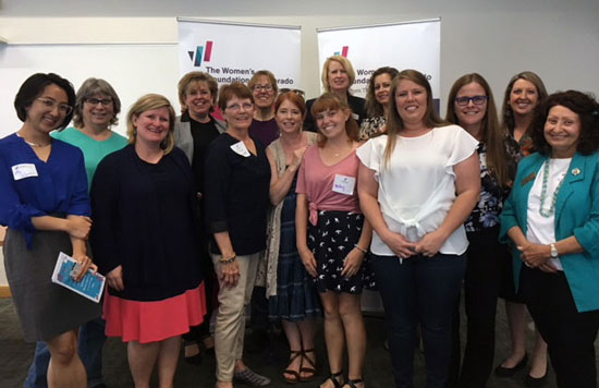 Group photo of Pueblo committee and event attendees